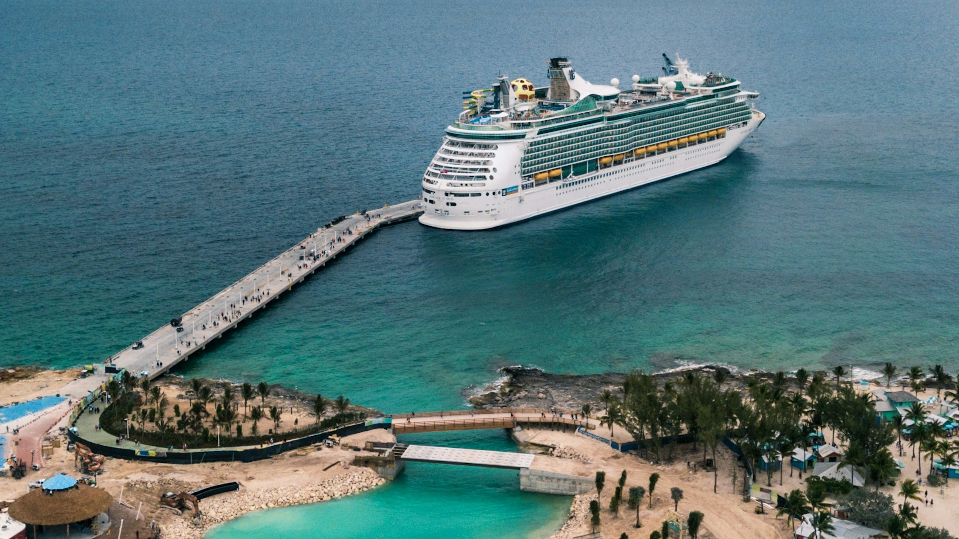 Royal Caribbean cruise ship at a private island pier